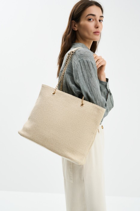 плетеная сумка от бренда снежная королева вид слева