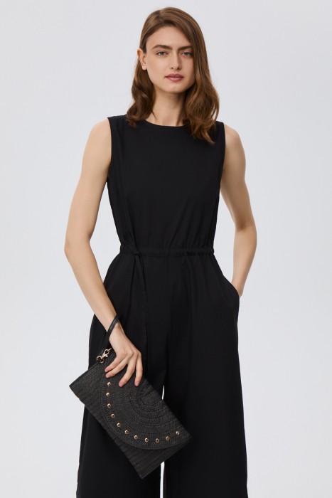 плетеный клатч от бренда снежная королева вид слева