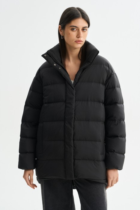 пуховик от бренда снежная королева вид слева