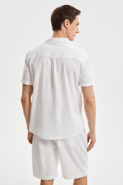 рубашка-поло по цене 2340 руб вид справа