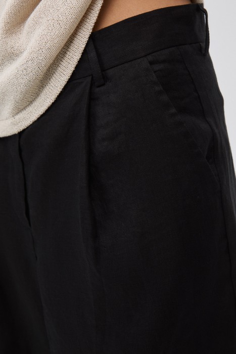 широкие брюки изо льна из россии вид сбоку