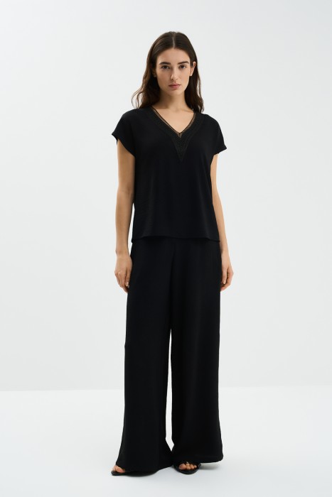 широкие брюки от бренда снежная королева вид слева