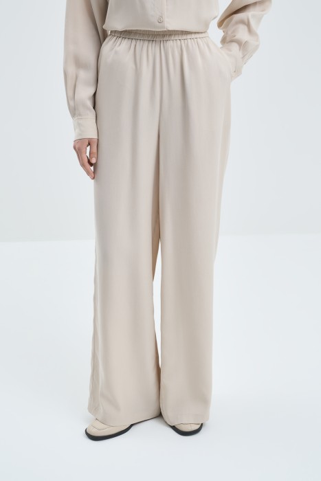 широкие брюки от бренда снежная королева вид слева