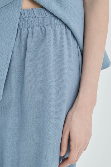 широкие брюки из россии вид сбоку