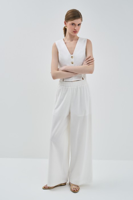 широкие брюки от бренда снежная королева вид слева