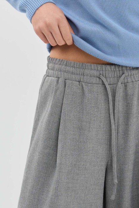 широкие брюки от бренда снежная королева вид слева