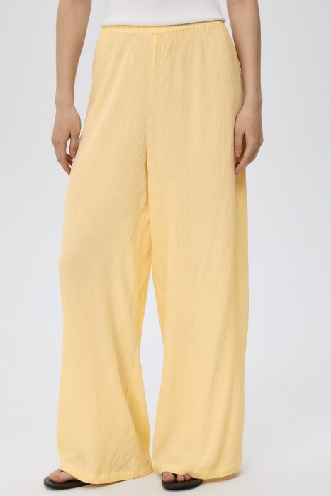 широкие брюки от бренда снежная королева вид слева