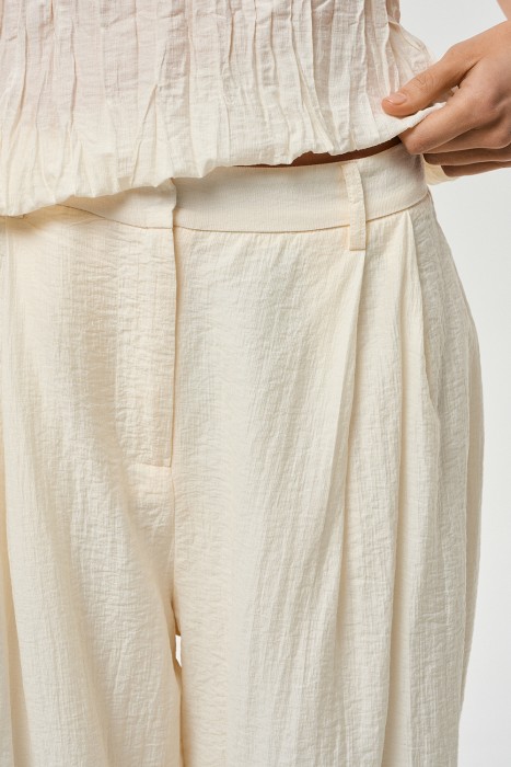 широкие брюки из россии вид сбоку