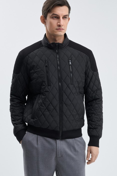 стеганая куртка-бомбер от бренда снежная королева вид слева