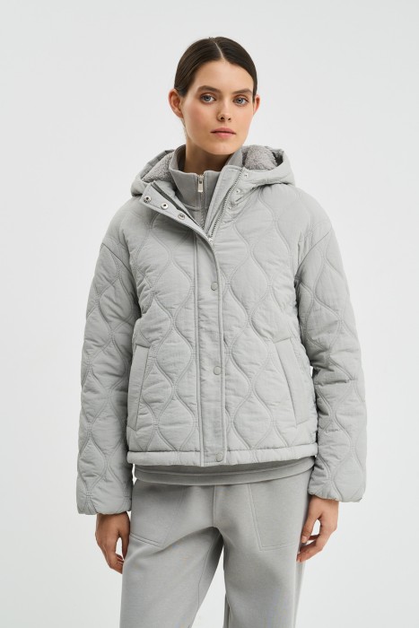 стеганая куртка с капюшоном от бренда снежная королева вид слева