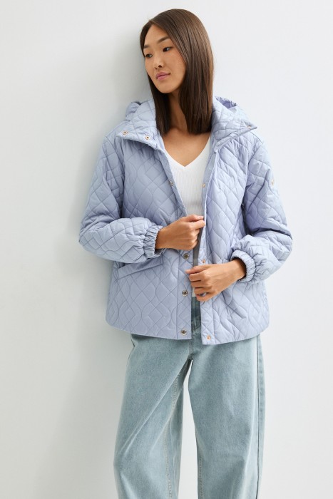 стеганая куртка с капюшоном из россии вид сбоку