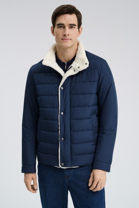 стеганая куртка с отделкой меховой тканью от бренда снежная королева вид слева