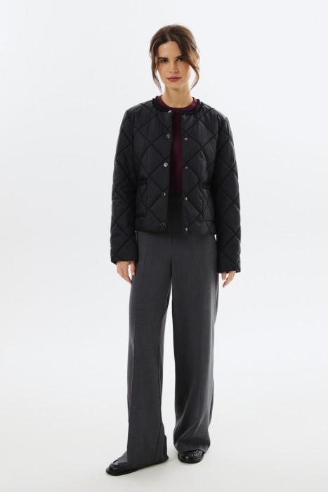 стеганая куртка с отделкой от бренда снежная королева вид слева