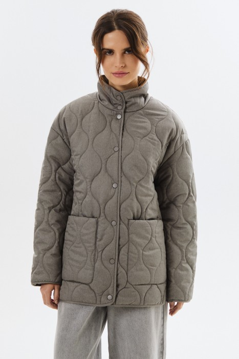 стеганая куртка от бренда снежная королева вид слева