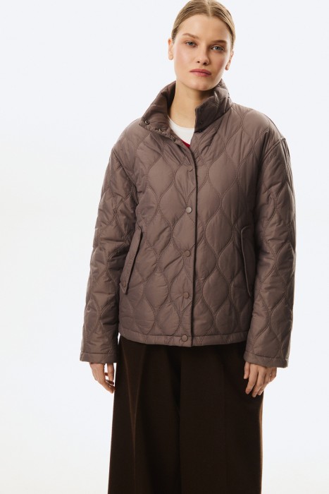 стеганая куртка от бренда снежная королева вид слева