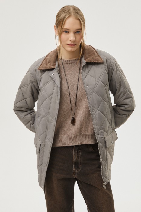 стеганая куртка от бренда снежная королева вид слева