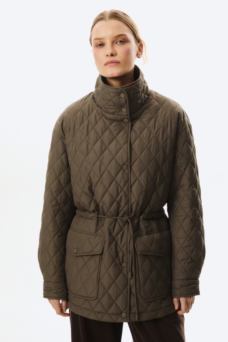 стеганая куртка от бренда снежная королева вид слева