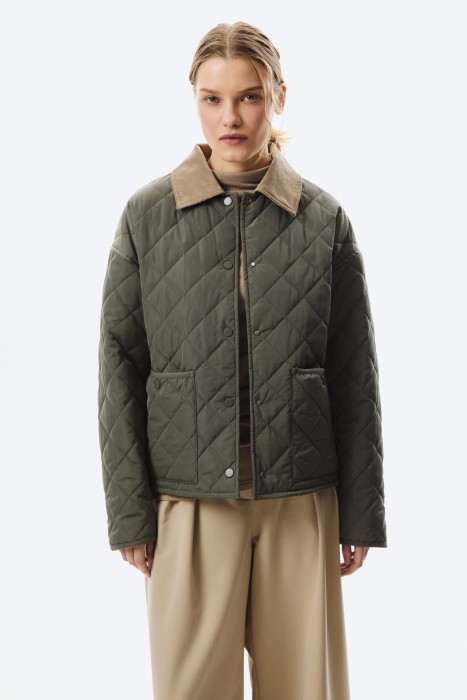 стеганая куртка от бренда снежная королева вид слева