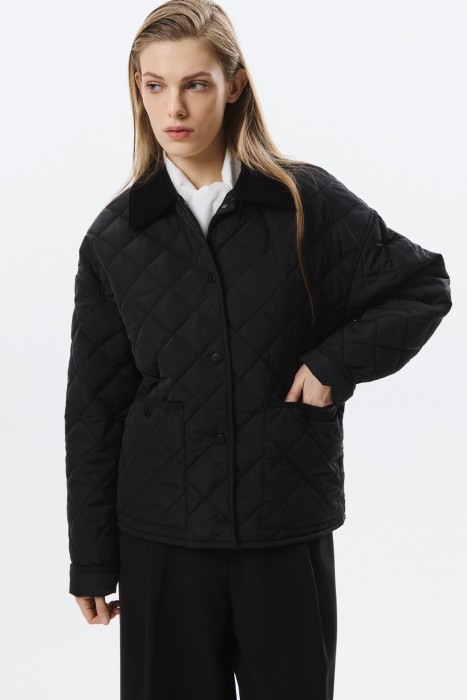 стеганая куртка от бренда снежная королева вид слева