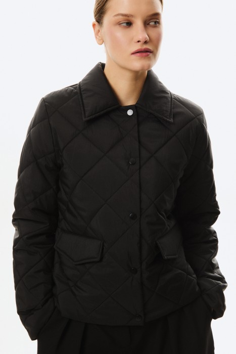 стеганая куртка от бренда снежная королева вид слева