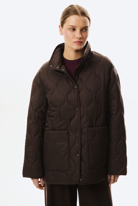 стеганая куртка от бренда снежная королева вид слева