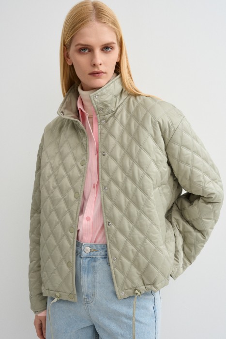 стеганая куртка от бренда снежная королева вид слева