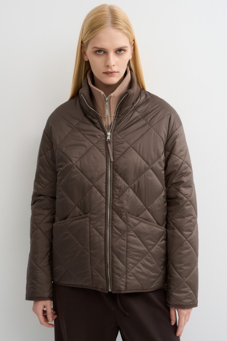 стеганая куртка от бренда снежная королева вид слева