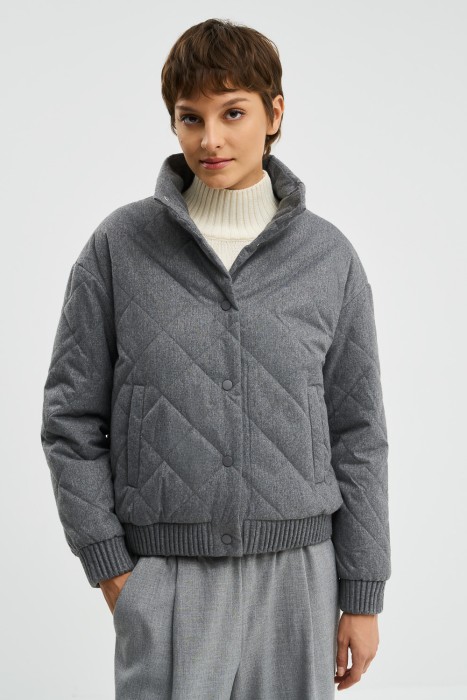 стеганая куртка от бренда снежная королева вид слева