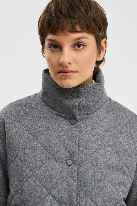 стеганая куртка из россии вид сбоку