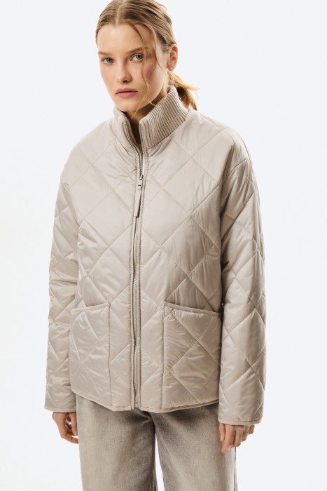 стеганая куртка от бренда снежная королева вид слева