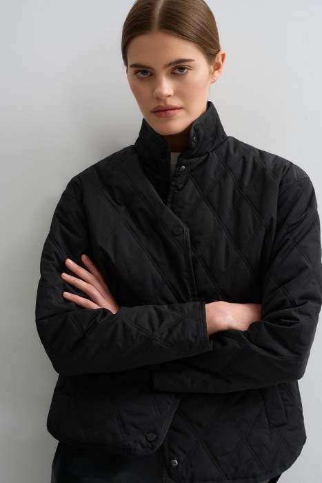 стеганая куртка от бренда снежная королева вид слева