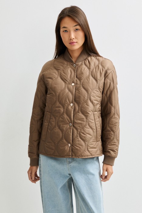 стеганая куртка от бренда снежная королева вид слева