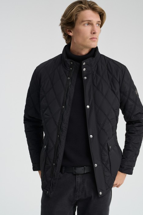 стеганая куртка от бренда снежная королева вид слева