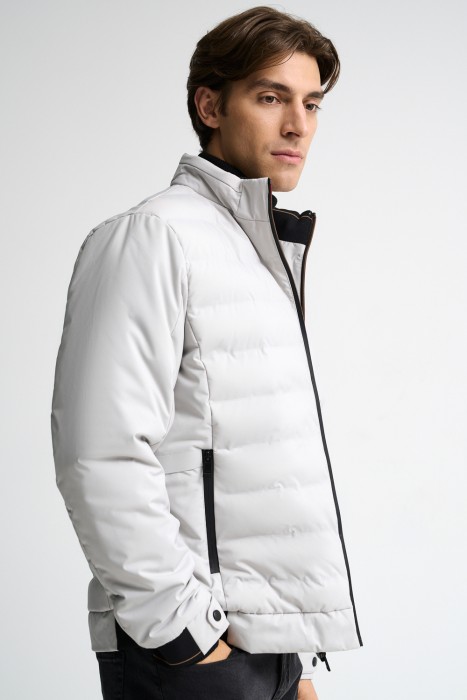 стеганая куртка от бренда снежная королева вид слева