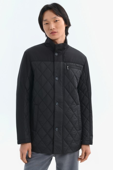 стеганая куртка от бренда снежная королева вид слева