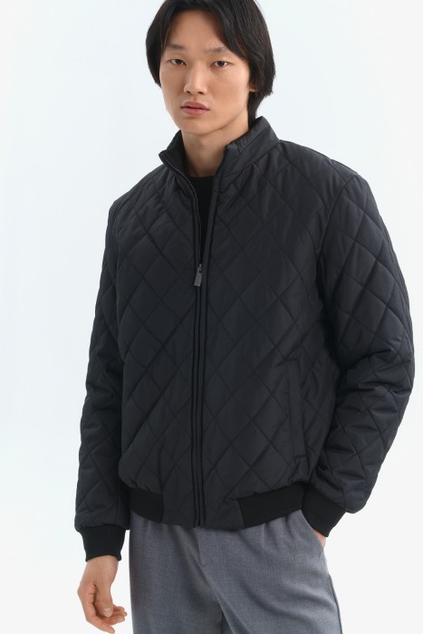 стеганая куртка от бренда снежная королева вид слева