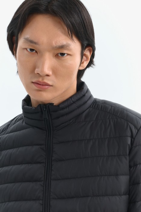 стеганая куртка от бренда снежная королева вид слева