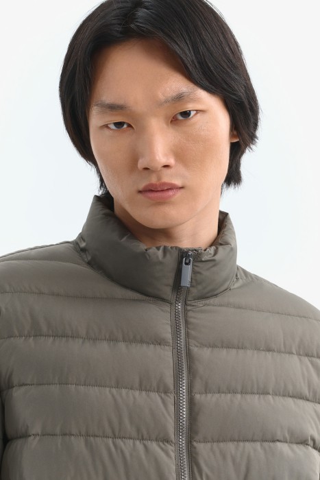 стеганая куртка от бренда снежная королева вид слева