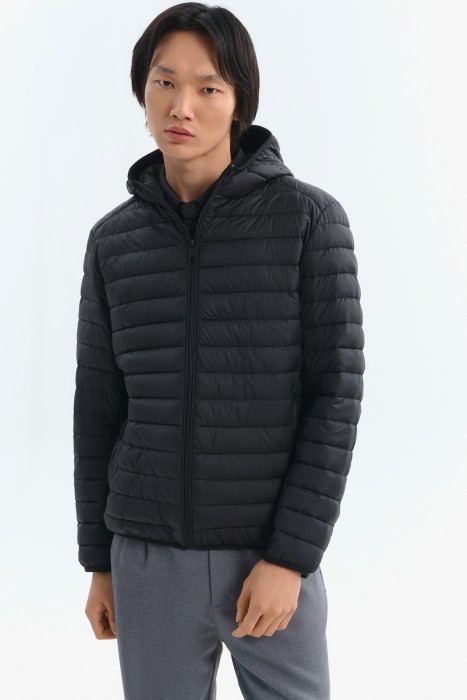 стеганая куртка от бренда снежная королева вид слева