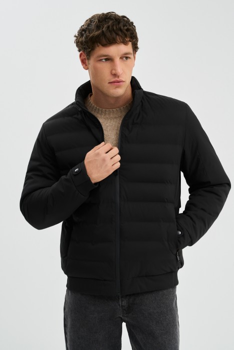 стеганая куртка от бренда снежная королева вид слева