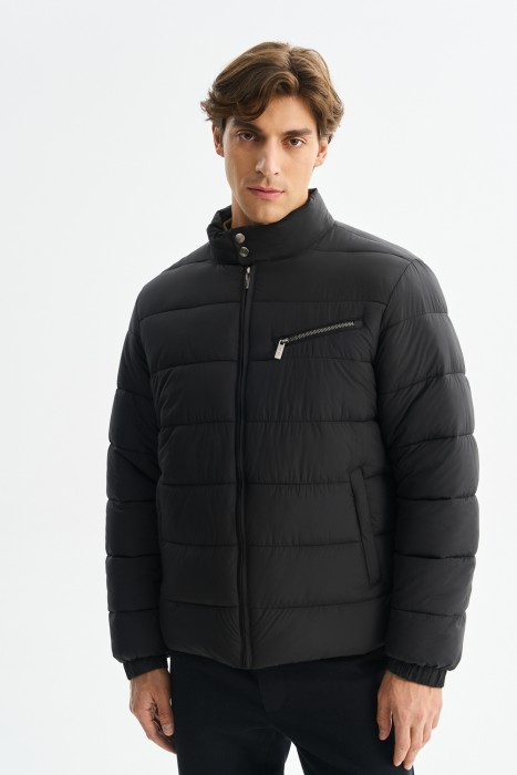 стеганая куртка от бренда снежная королева вид слева