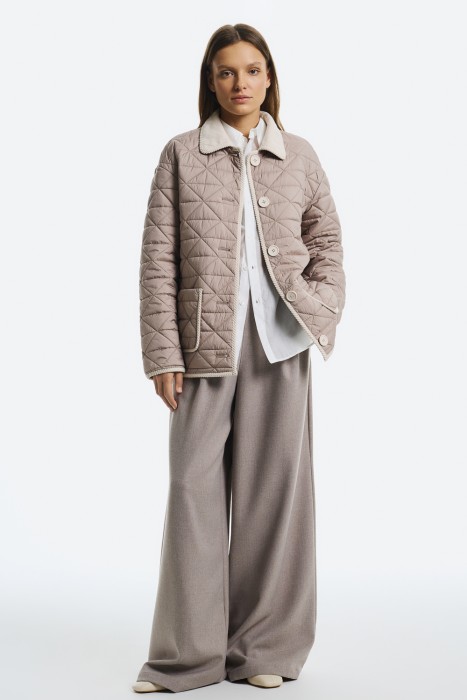 стеганая куртка от бренда снежная королева вид слева