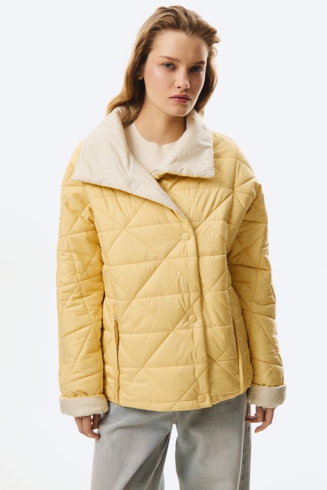 стеганая куртка от бренда снежная королева вид слева