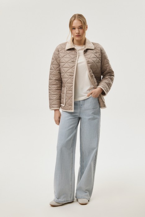 стеганая куртка от бренда снежная королева вид слева