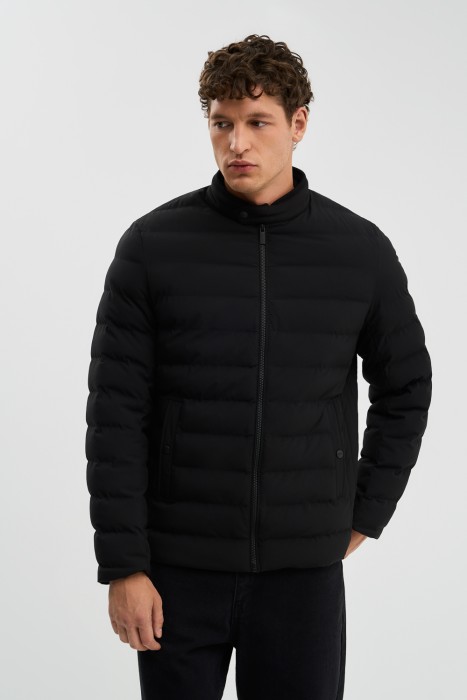 стеганая куртка от бренда снежная королева вид слева