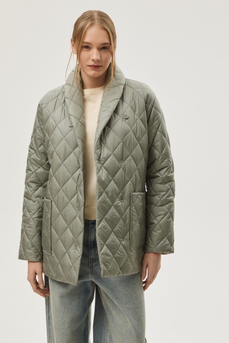 стеганая куртка от бренда снежная королева вид слева