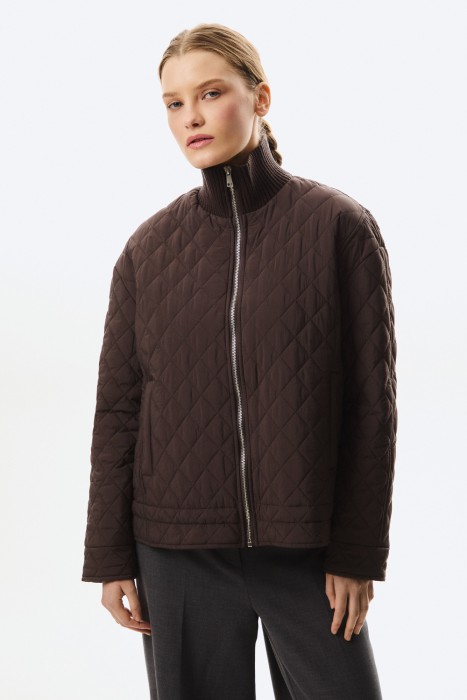 стеганая куртка от бренда снежная королева вид слева