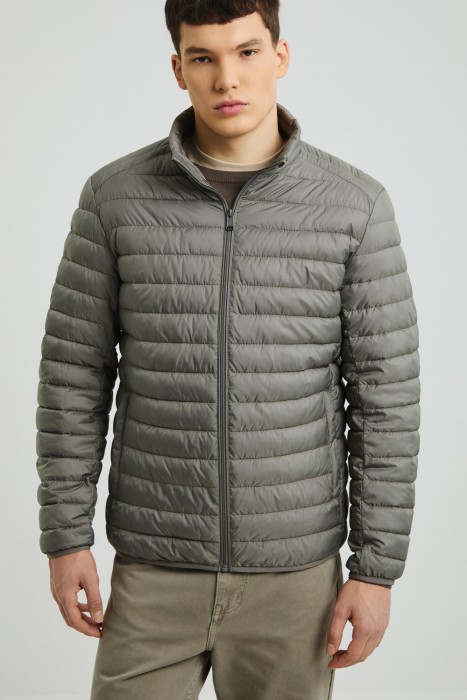 стеганая куртка от бренда снежная королева вид слева