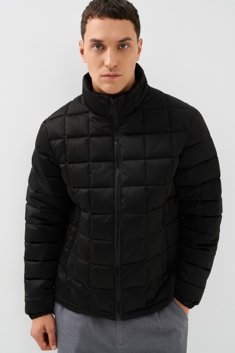 стеганая куртка от бренда снежная королева вид слева