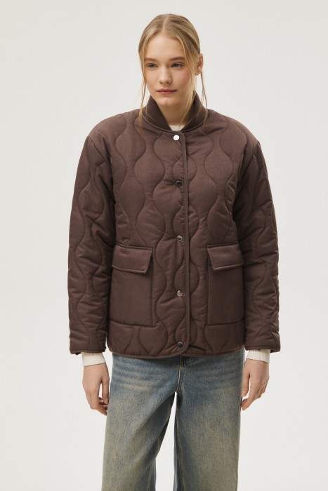 стеганая куртка от бренда снежная королева вид слева